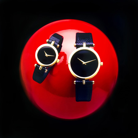 His and Hers modern gold watches.の写真素材