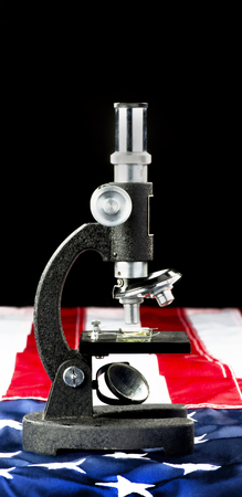 Microscope on American flag with room for your type.