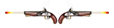 Two antique flintlock pistols firing musketballs.の写真素材