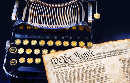 We the People preamble to the US Constitution on top of a antique typewritter.の写真素材