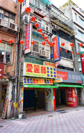 Taipei, Taiwan - Dec.2,2018 - A typical doentown street in Taipei, the store owner runs the shop on the street and lives in the above floors of their apartment.のeditorial素材