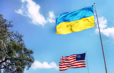 Ukraine and American flag flying togeather with pride.の写真素材