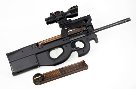 5.7 x 28mm bull pup assault rifle with large red dot scope.