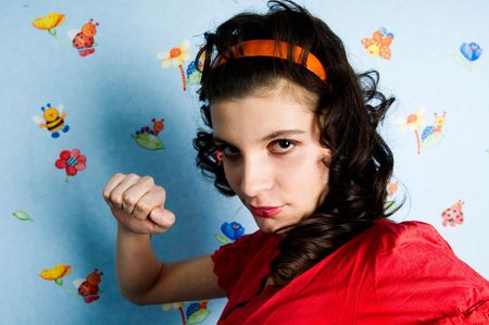 Girl ready to hit the viewer with her fistの写真素材