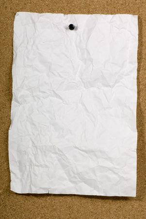 Page of old run-down paper attached to the bulletin board.の写真素材