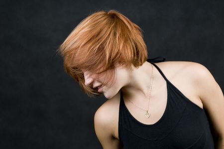 Portrait of a beautiful red haired girl.の写真素材