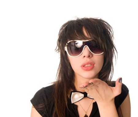 Teenage girl sending a kiss on white backgroundの写真素材