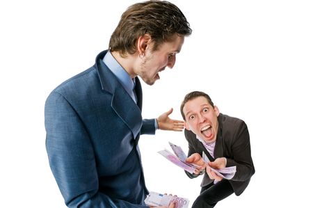 Two young businessmen with lots of cash on white backgroundの写真素材