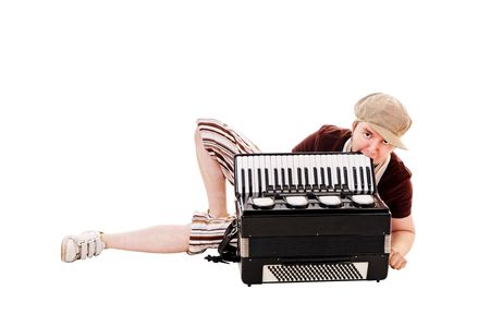 Cool young musician with concertina isolated on white backgroundの写真素材