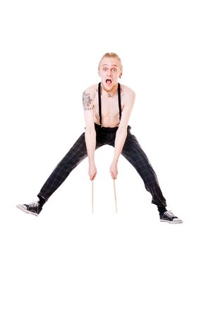 Cool young drummer isolated on white backgroundの写真素材