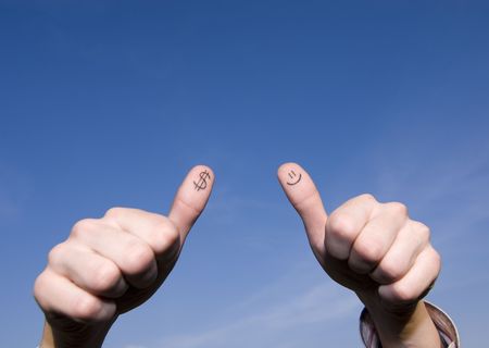 Thumbs up! with a dollar sign and a smiley :) in a warm sunset light