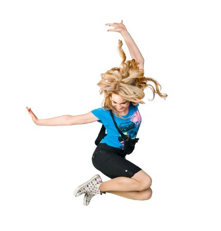 Excited girl jumping high isolated on whiteの写真素材