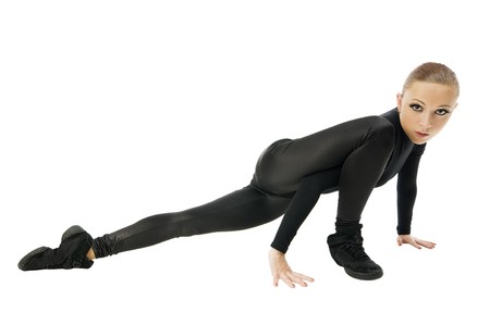 Beautiful modern dancer wearing black on white backgroundの写真素材