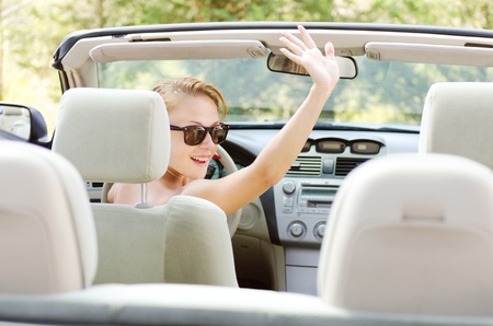 Young woman in carの写真素材