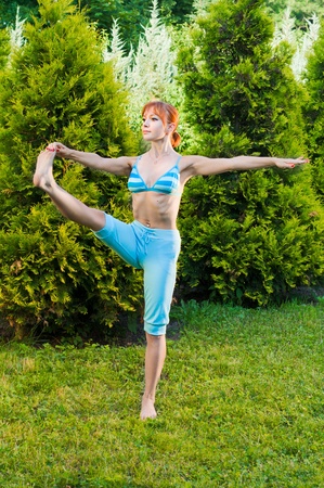 Beautiful woman practicing fitness or yogaの写真素材