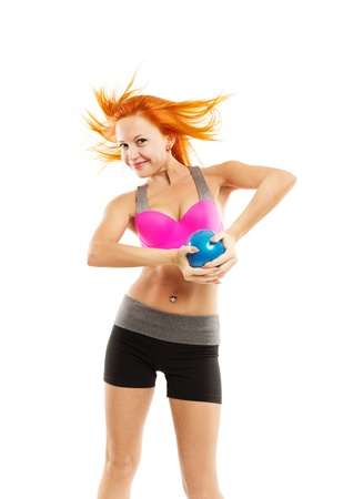 Beautiful sensual woman doing fitness with ballの写真素材