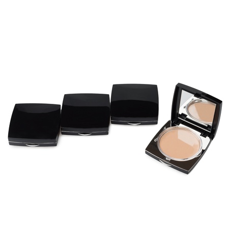 Makeup Powder with mirror on a white backgroundの写真素材