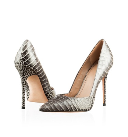 Pair of modern fashionable women shoes shot in studioの写真素材
