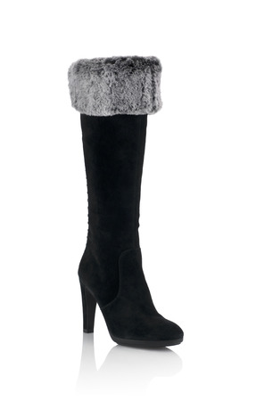 Modern fashionable women winter boot shot in studioの写真素材