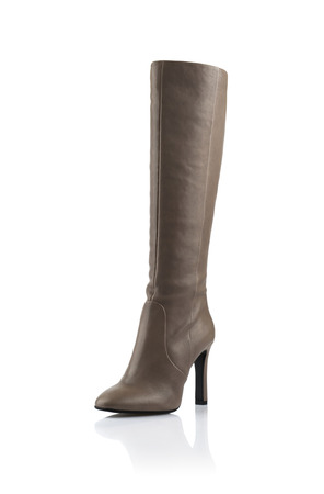 Modern fashionable women winter boot shot in studioの写真素材