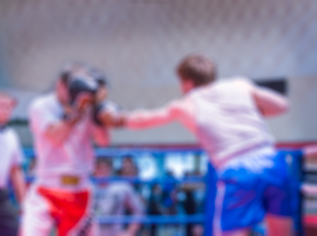 Boxing match abstract blur sports background with bokehの写真素材