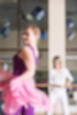 Dance class for women at fitness centre abstract blur backgroundの写真素材