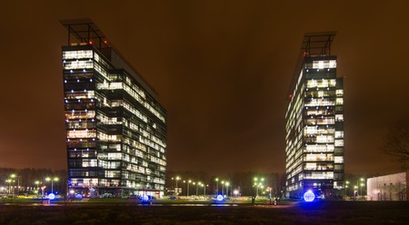 MOSCOW, RUSSIA - November 25, 2010 - Commercial office buildings located in Khimki district exterior shot at nightのeditorial素材