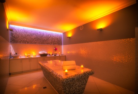 MOSCOW, RUSSIA - December 1, 2014 - Spa salon interior with lit candles in massage therapy roomのeditorial素材