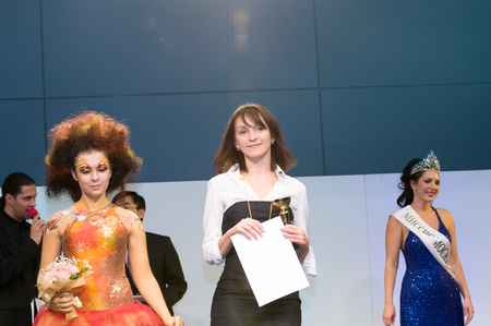 MOSCOW, RUSSIA - October 28, 2009 - Participants of makeup and hair artists competition  at Intercharm exhibition public eventのeditorial素材