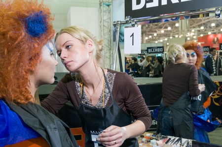 MOSCOW, RUSSIA - October 28, 2009 - Participants of makeup and hair artists competition  at Intercharm exhibition public eventのeditorial素材