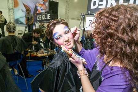 MOSCOW, RUSSIA - October 28, 2009 - Participants of makeup and hair artists competition  at Intercharm exhibition public eventのeditorial素材
