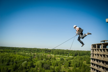 MOSCOW, RUSSIA - June 3, 2007 - People at extreme sports Ropejumping event. Group of rope jumpers organize such events for people seeking to bring a dose of adrenaline in their lifeのeditorial素材