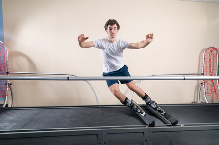 MOSCOW, RUSSIA - September 23, 2010 - Athlete working out on interactive ski simulator at the gymのeditorial素材