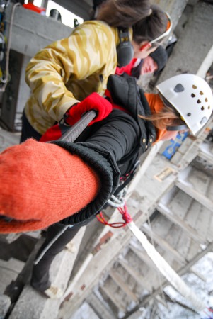 ZHELEZNODOROZHNIY, RUSSIA - March 9, 2008 - Rope jumping event held at the abandoned building construction site. Sports enthusiast groups organize such events for adrenaline lovers from all over Moscow districtのeditorial素材