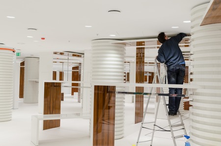 MOSCOW, RUSSIA - February 22, 2012 - New store at large shopping mall. Pre-opening dayのeditorial素材