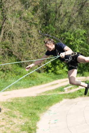 MOROZKI, RUSSIA - May 27, 2007 - Ropejumper jumping off the bridgeのeditorial素材