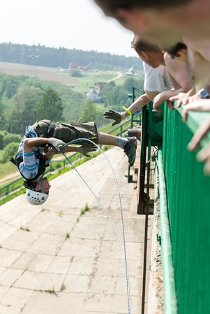 MOROZKI, RUSSIA - May 27, 2007 - Ropejumpers jumping off the bridgeのeditorial素材