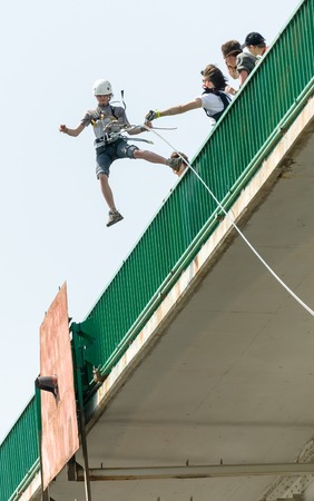 MOROZKI, RUSSIA - May 27, 2007 - Ropejumpers jumping off the bridgeのeditorial素材