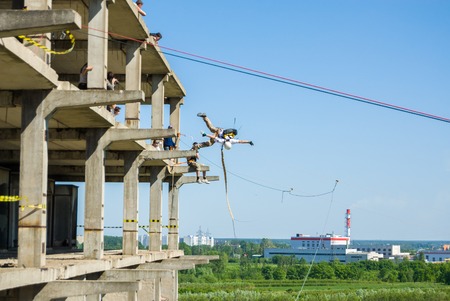 MOSCOW, RUSSIA - June 3, 2007 - People at extreme sports Ropejumping event. Group of rope jumpers organize such events for people seeking to bring a dose of adrenaline in their lifeのeditorial素材