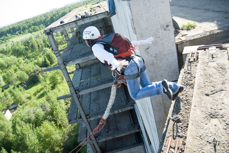 MOSCOW, RUSSIA - June 3, 2007 - People at extreme sports Ropejumping event. Group of rope jumpers...