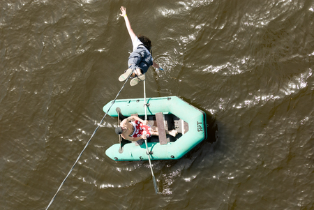 MOROZKI, RUSSIA - May 27, 2007 - Ropejumpers jumping off the bridgeのeditorial素材