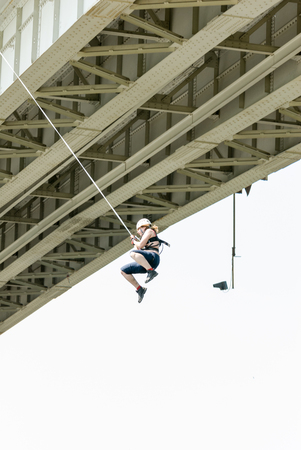 MOROZKI, RUSSIA - May 27, 2007 - Ropejumpers jumping off the bridgeのeditorial素材