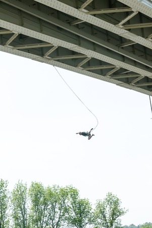 MOROZKI, RUSSIA - May 27, 2007 - Ropejumpers jumping off the bridgeのeditorial素材