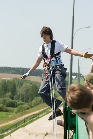 MOROZKI, RUSSIA - May 27, 2007 - Ropejumpers jumping off the bridgeのeditorial素材