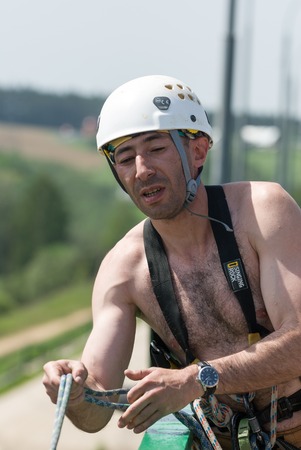 MOROZKI, RUSSIA - May 27, 2007 - Ropejumpers jumping off the bridgeのeditorial素材