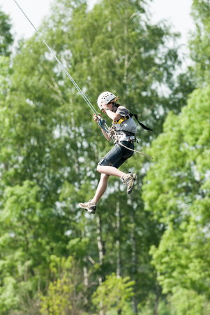 MOROZKI, RUSSIA - May 27, 2007 - Ropejumpers jumping off the bridgeのeditorial素材