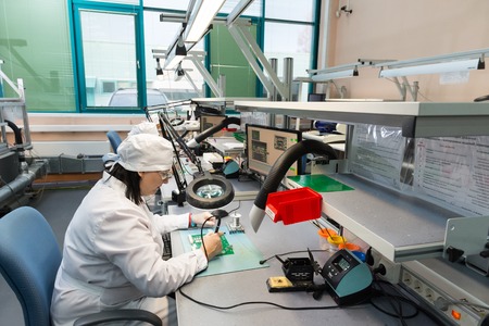 MOSCOW, RUSSIA - November 27, 2014 - Production of electronic components  at high-tech factoryのeditorial素材
