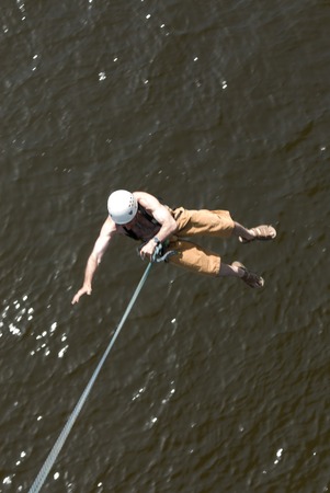 MOROZKI, RUSSIA - May 27, 2007 - Ropejumpers jumping off the bridgeのeditorial素材