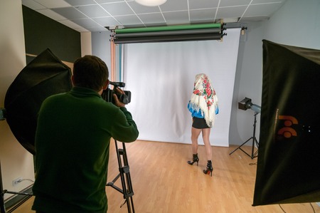 MOSCOW, RUSSIA - October 22, 2009 - Transgender LGBT group of people video shoot backstage in studioのeditorial素材