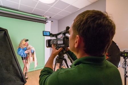 MOSCOW, RUSSIA - October 22, 2009 - Transgender LGBT group of people video shoot backstage in studioのeditorial素材